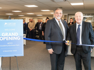 Associates of Cape Cod's President and CEO Dr. A.J. Meuse and Councillor Tony Brennan, Knowsley Council’s Cabinet Member for Regeneration and Economic Development at ribbon cutting for ACCI at Academy Business Park, Knowsley